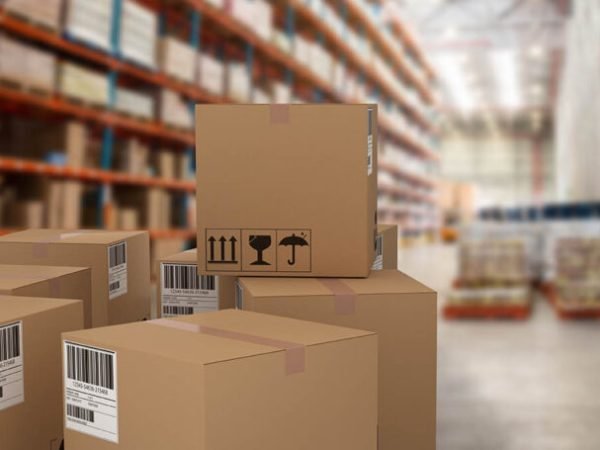 Group of illustrated cardboard boxes against cardboard boxes on rack